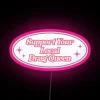 Neon sign with colorful letters spelling out 'Support Your Local Drag Queen'