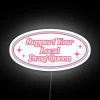 Drag queen support neon sign with colorful letters on a white background
