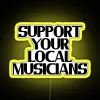 Neon sign reading 'Support Your Local Musicians' in vibrant colors.