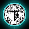 Neon sign supporting local electricians, power linemen, and pole dancers in the service industry.