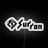 Neon sign reading 'Sur-Ron 2' in bold, white font on a dark background.