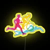 Triathlon logo collection featuring neon signs, swim, bike, run elements.