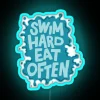 Neon sign with bold, colorful letters reading 'Swim Hard Eat Often'