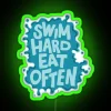 Neon sign with bold, colorful letters reading "Swim Hard Eat Often" in a futuristic style.