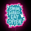 Neon sign with colorful letters reading 'Swim Hard Eat Often'