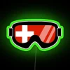 Neon neon sign with green Swiss flag colors and goggles design on a RGB background.