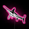 Neon sign with a colorful illustration of a swordfish in pink hues.