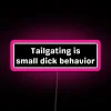 Neon sign reading 'Tailgating is small dick behavior'