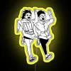 Two people, Takakura and Momo, running together under a vibrant yellow neon sign.