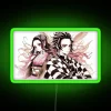 Tanjiro Kamado from Demon Slayer with his demonic sister Nezuko, standing in front of a vibrant neon sign that reads "Demo...