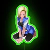 Tattooed Android with neon RGB colors under a green glow