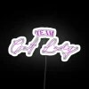 Neon sign featuring a cartoon cat in a team jersey surrounded by colorful, glowing graphics.
