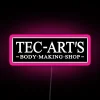 Neon pink sign with RGB LED lights in a modern art aesthetic.