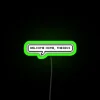 Technoblade's RGB neon sign with quote welcome home Theseus, green illumination effect.