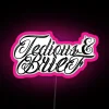 Neon sign with pink background and brief typography.