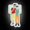 Teen Shin Chan and Kazama in front of an RGB neon sign.