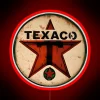 Vintage Texaco star sign with green and red neon lights
