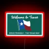 Drive-friendly road sign in Texas with neon glow, representing The Lone Star State's unique culture.