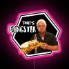 Neon pink sign with bold, graffiti-style letters reading "That's Gangster