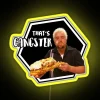 Neon "That's Gangster" sign with bright yellow letters on a dark background.