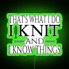 Neon sign with colorful, hand-knitted-themed RGB letters reading 'That's what I do'