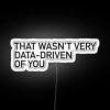 RGB neon sign with a sarcastic message about lacking data-driven decision making.