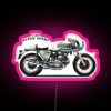 Neon sign with pink letters reading 'The 750 SS 1974'
