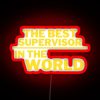 A neon sign with bold red letters reading 'The Best Supervisor'