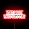 Neon sign reading 'The book was better'