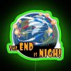 A neon sign with ominous glowing letters reading 'The End is Nigh'