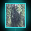 Neon sign featuring fir trees and crying tears in vibrant blue colors.