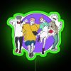 Group of friends posing in front of a colorful RGB neon sign with green accents.