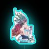 Neon sign featuring a colorful mermaid with glowing scales in an underwater setting.