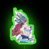 Neon RGB sign featuring a colorful mermaid silhouette in a modern city setting.
