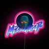 Neon pink sign reading 'The Messenger' in bold, futuristic font.