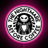 Vibrant neon sign with pink letters spelling out 'The Nightmare Before Coffee'
