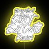 Kevin Malone from The Office, holding a neon sign with the phrase 'You can't eat cats'