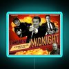 Dwight's Threat Level Midnight poster in neon signage, reminiscent of 1950s style, from The Office TV show.