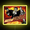 Dwight Schrute's Threat Level Midnight poster, a neon-lit 1950s-style artwork featuring Michael Scott in an action hero pose.