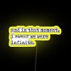 Neon sign reading 'The Perks of Being a Wallflower' in colorful, retro font with yellow highlights.