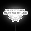 Neon sign with colorful letters spelling out 'The sun will rise and we will try again'