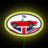 Neon sign with vibrant RGB colors and yellow background, featuring a TR6 design