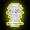 Neon sign with bold, colorful letters reading 'There Is Freedom'