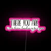Rhysand's iconic quote from ACOTAR on a pink neon sign, symbolizing his presence and protection.