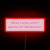 Rgb neon sign with humorous bumper sticker referencing the comedy classic.