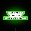 Neon sign with bold RGB colors and edgy typography reading 'They told me I couldn't, that's why I did it.'