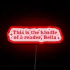 Neon sign with humorous quote about reading, inspired by Bella from Twilight.