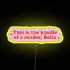 Reader by day, bookworm by night, funny books quote neon sign.