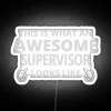 Neon sign with bold, colorful letters spelling out the phrase 'Awesome Supervisor'