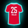 Thomas Müller posing in front of an RGB neon sign reading 'München 23' with blue accents.